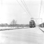150922 Afbeelding van een electrisch treinstel mat. 1946 van de N.S. in een sneeuwlandschap ter hoogte van Hulshorst.